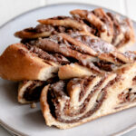 Image of slices of chocolate nut swirled bread.