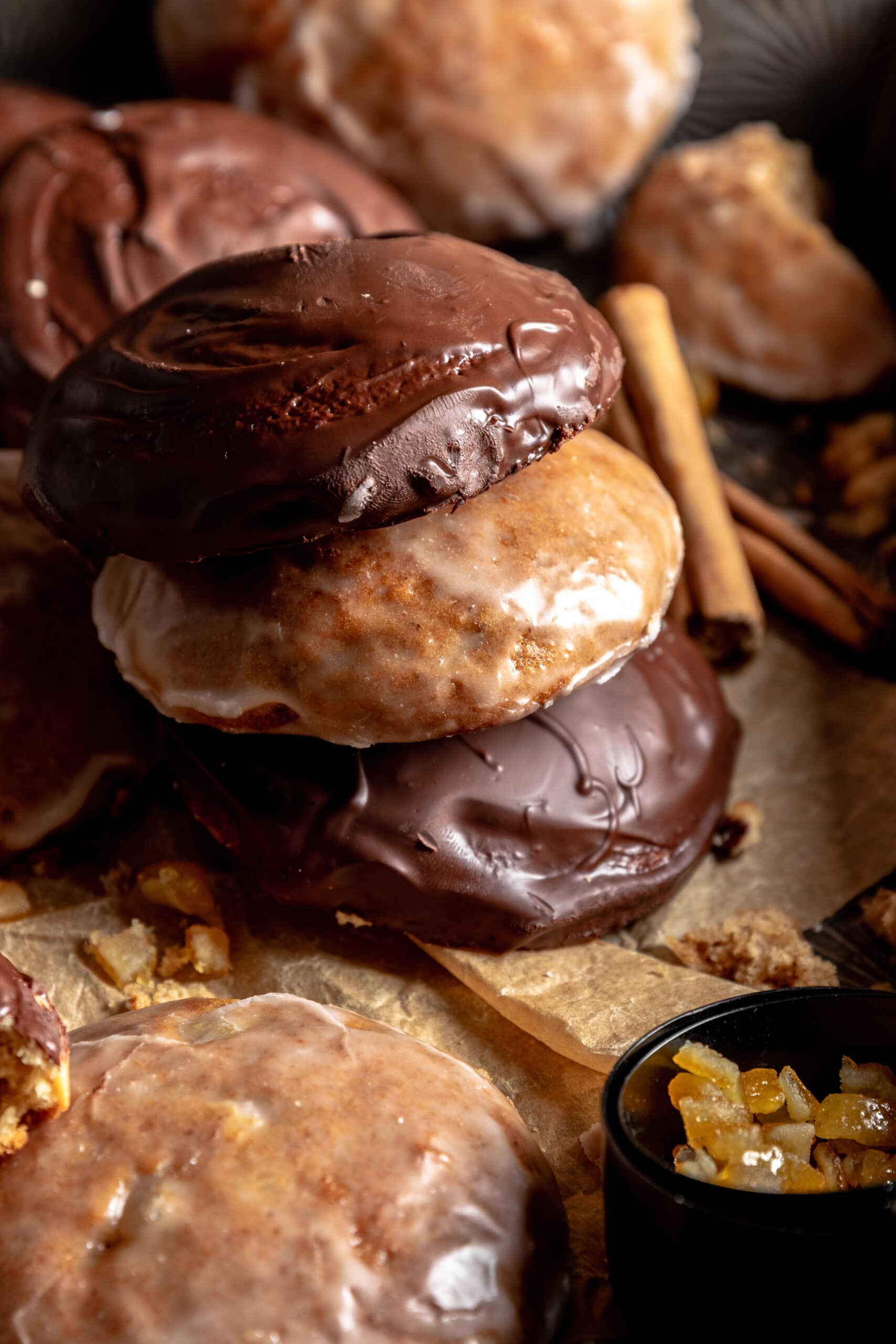 Side view of a stack of chocolate and plain glazed lebkuchen.