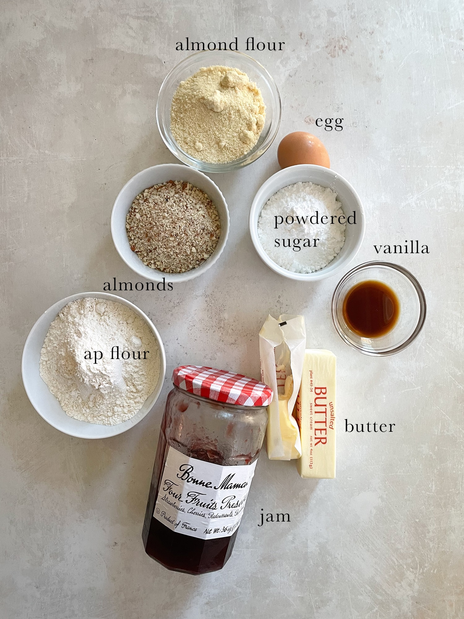 Ingredients laid out and labeled for a linzer torte.