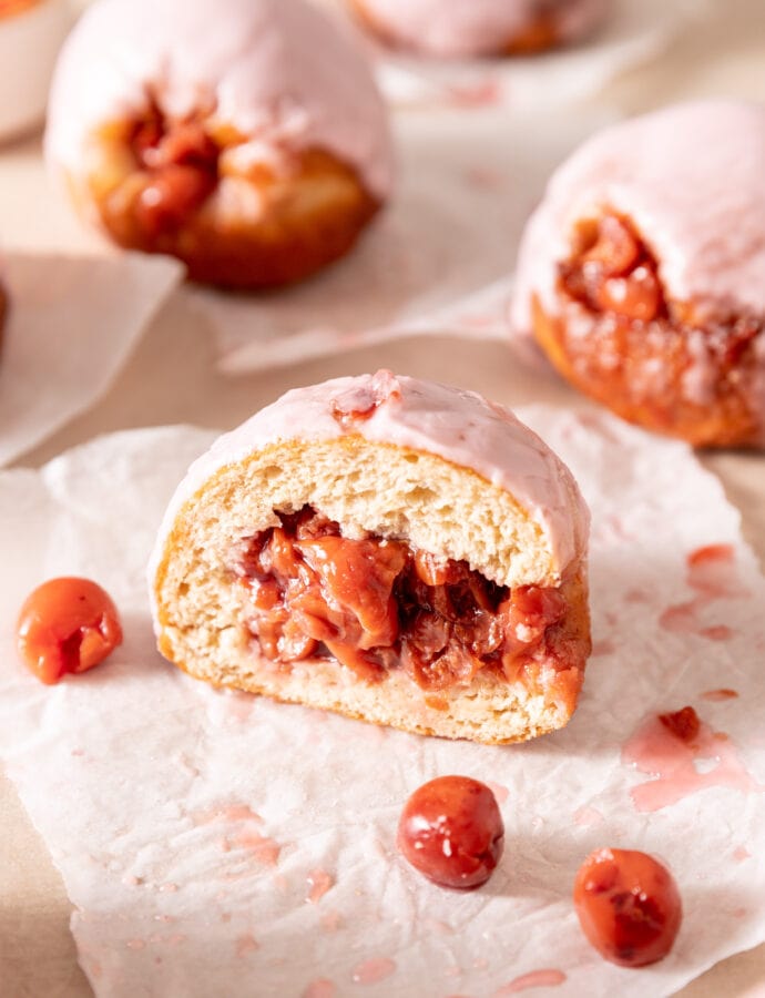 Cherry Filled Spiced Doughnuts with Cherry Glaze
