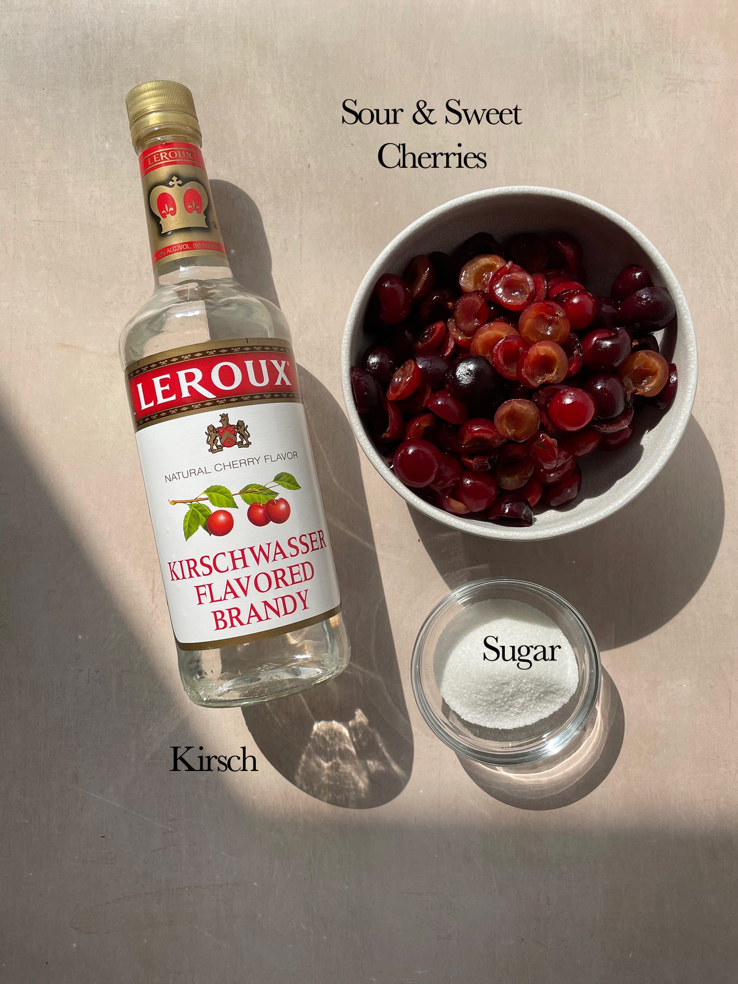 Ingredients needed to make kirsch roasted cherries. 