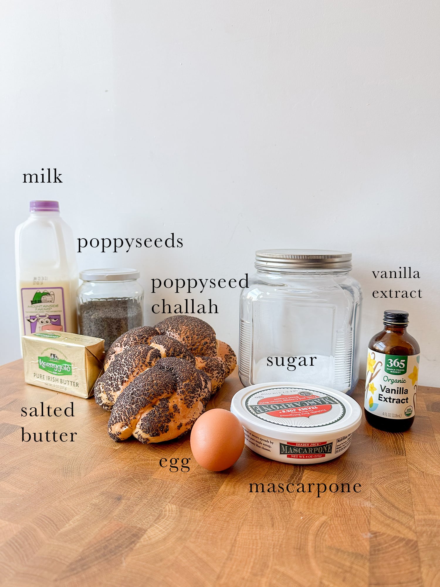 Ingredients needed to make poppyseed stuffed french toast laid out and labeled. 