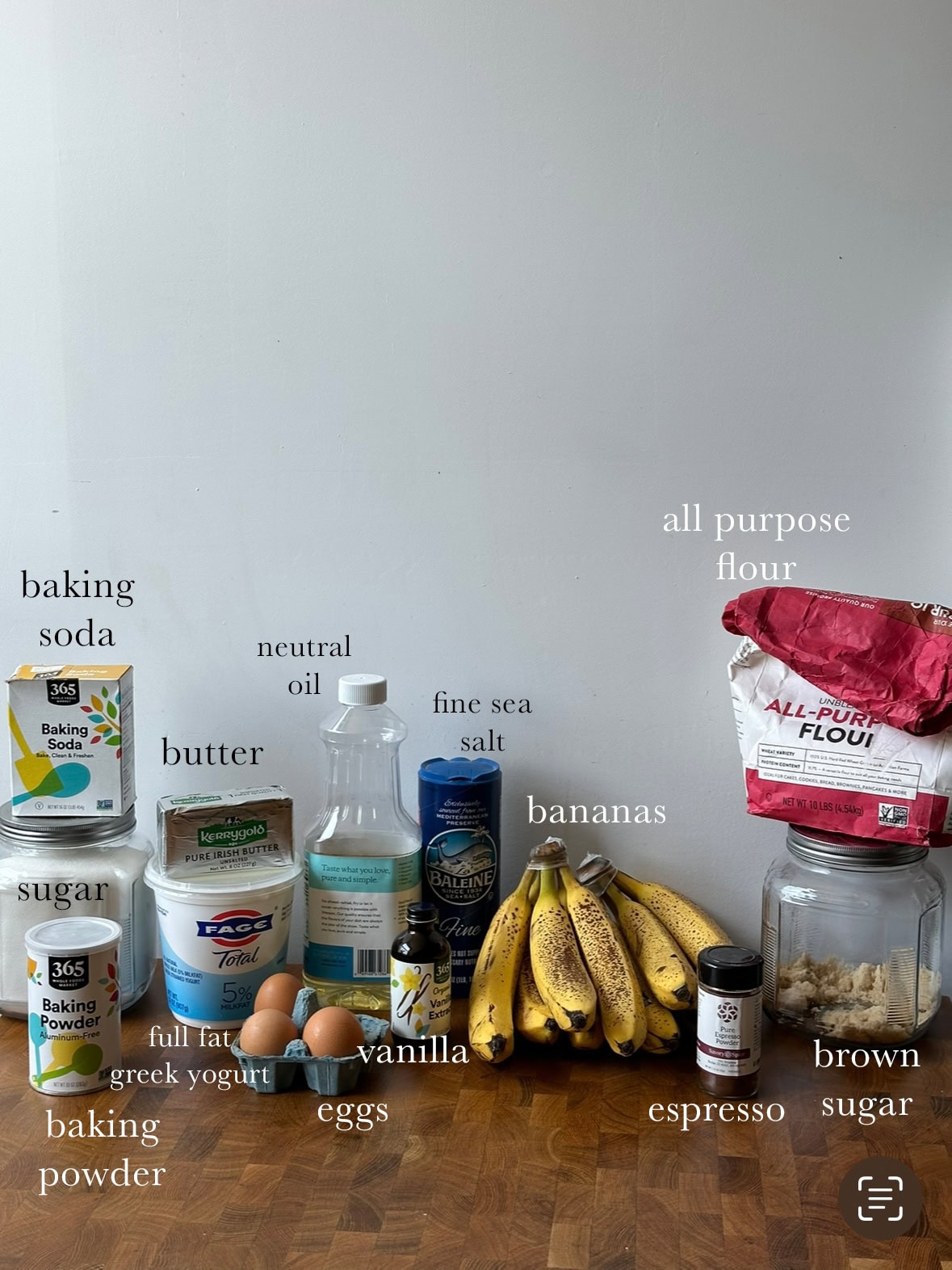 All ingredients needed to make a banana bread upside down cake laid out and labeled.