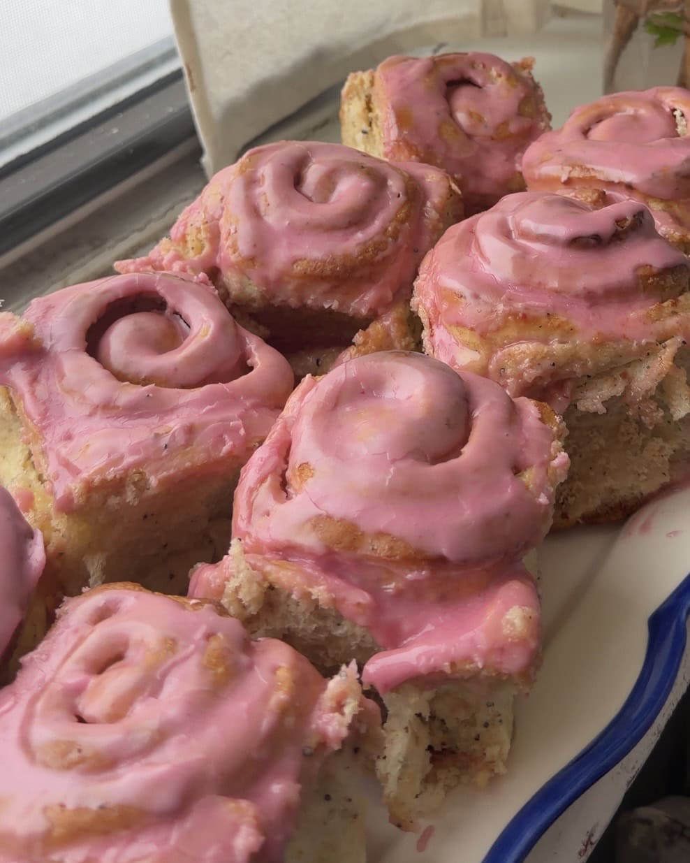 Side view of a platter with 8 of the Cardamom Blood Orange Buns.