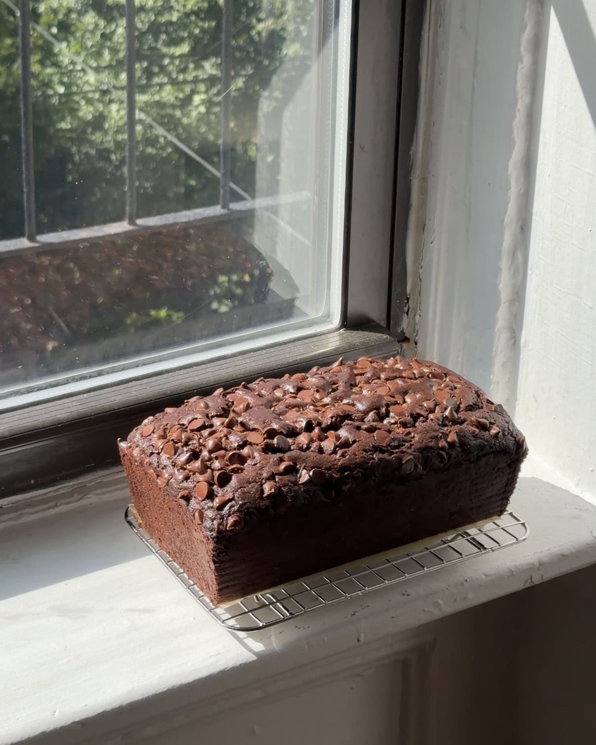Side view of a whole Double Chocolate Zucchini Loaf.