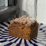 Side view of a slice of Brown Sugar Pumpkin Coffee Cake.