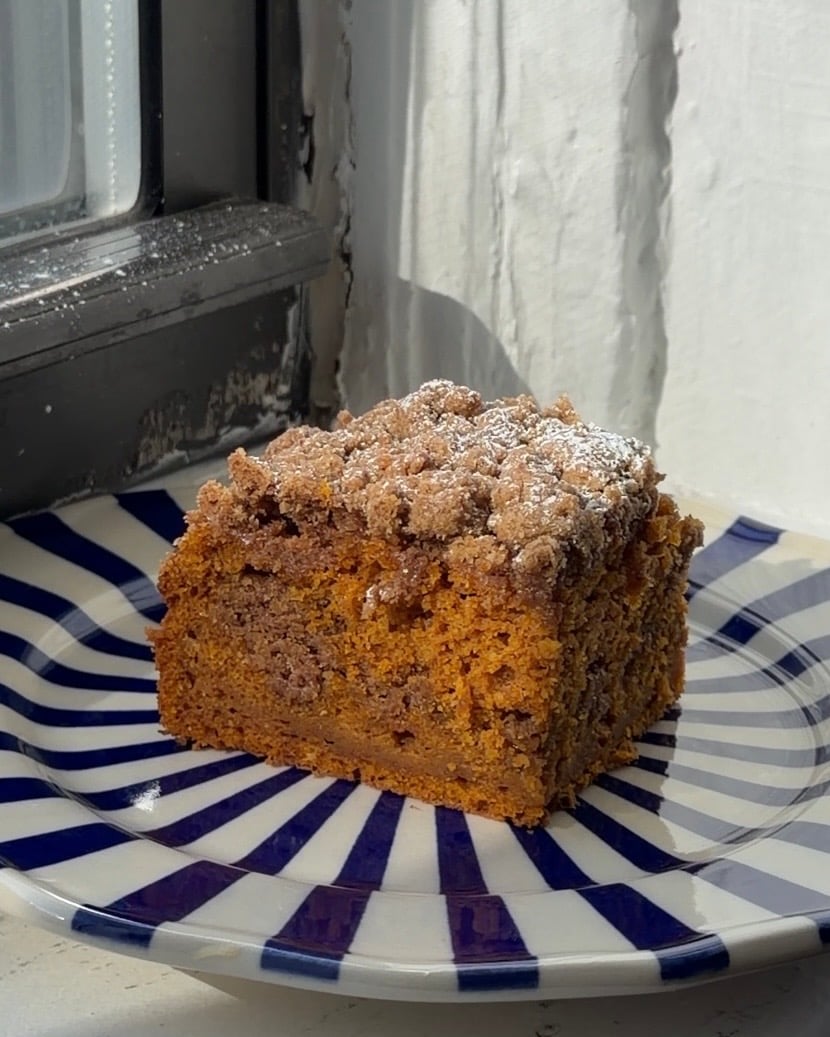 Side view of a slice of Brown Sugar Pumpkin Coffee Cake.